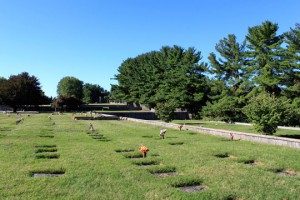 Abbey garden landscape view with bronze memorials.