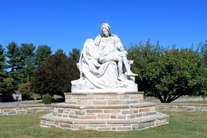Holy Cross garden La Pieta feature of Jesus' body being held by his mother Mary.