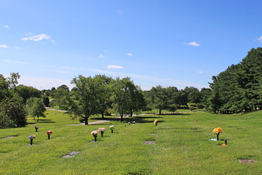 Ground Burial includes flat bronze memorials.