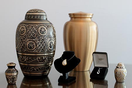 Cremation Services and memorial items including urns, keepsakes, and jewelry.