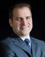 John O. Mitchell IV portrait.